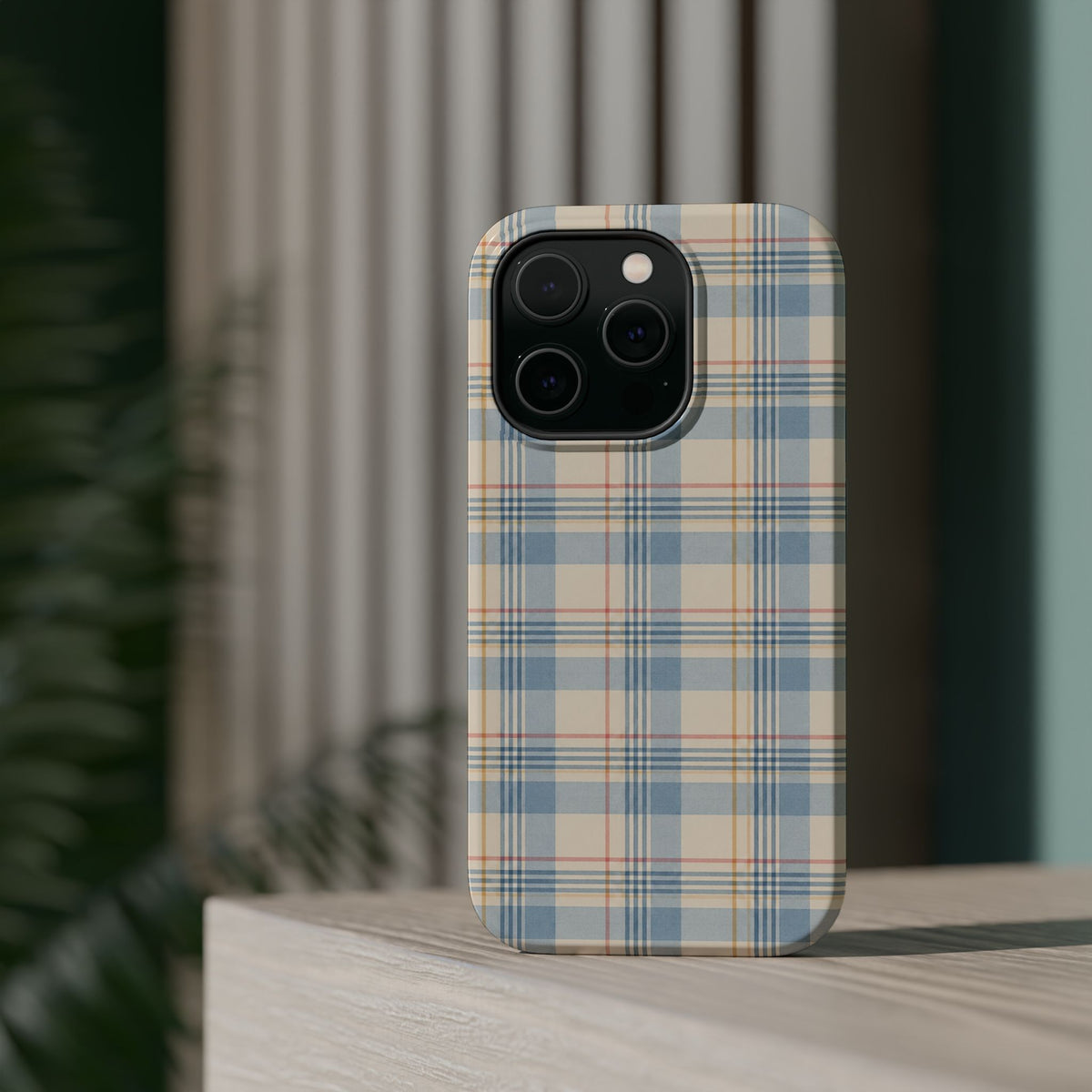 Ranch Check – Blue and Cream Plaid MagSafe Phone Case, glossy square triple-camera Pro model, rear view on a tabletop