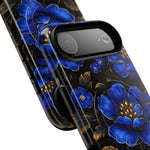 Two smartphones with blue floral pattern cases featuring large and small flower variants