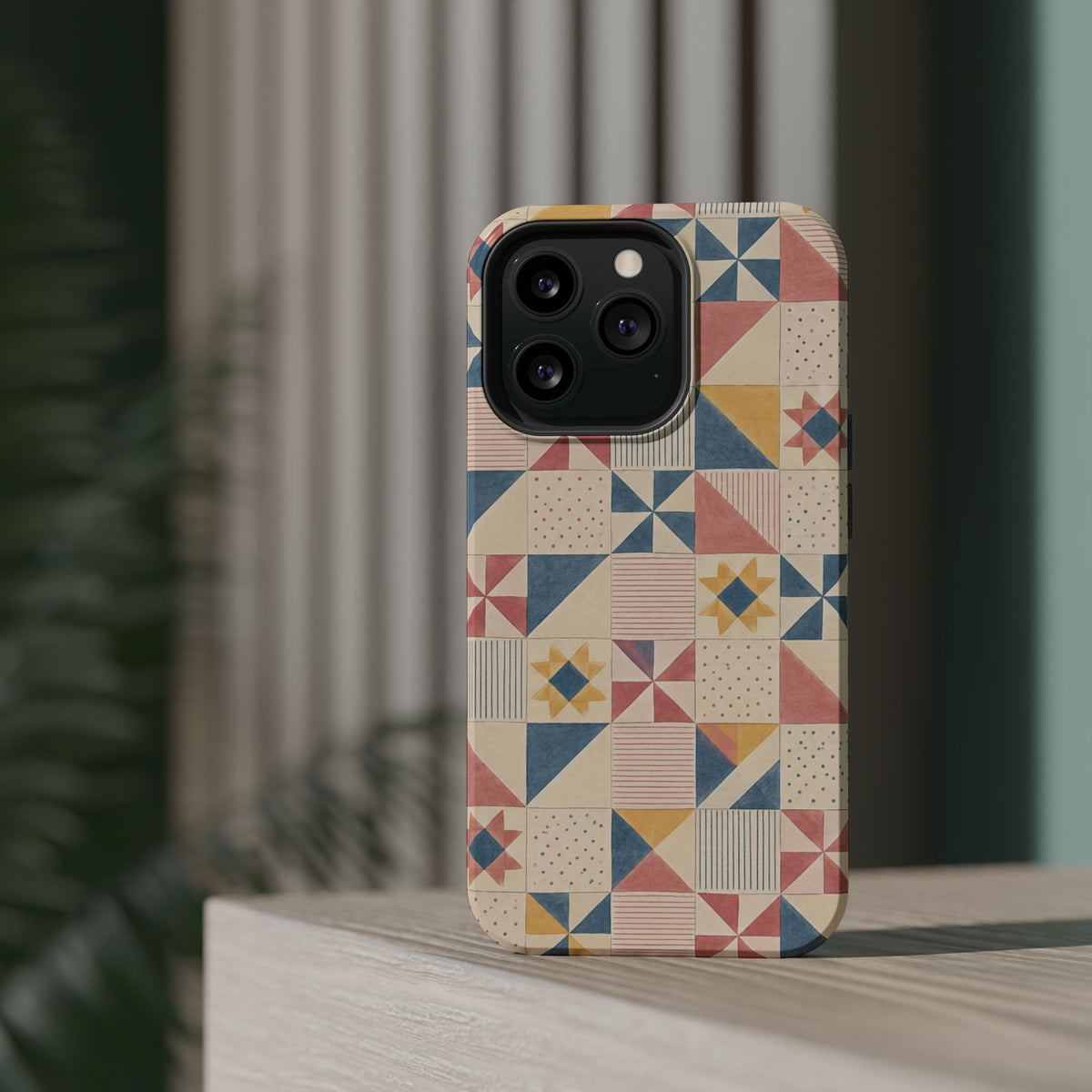 Prairie Quilt – Pastel Patchwork Pattern MagSafe Phone Case, glossy square triple-camera Pro model, rear view on a tabletop