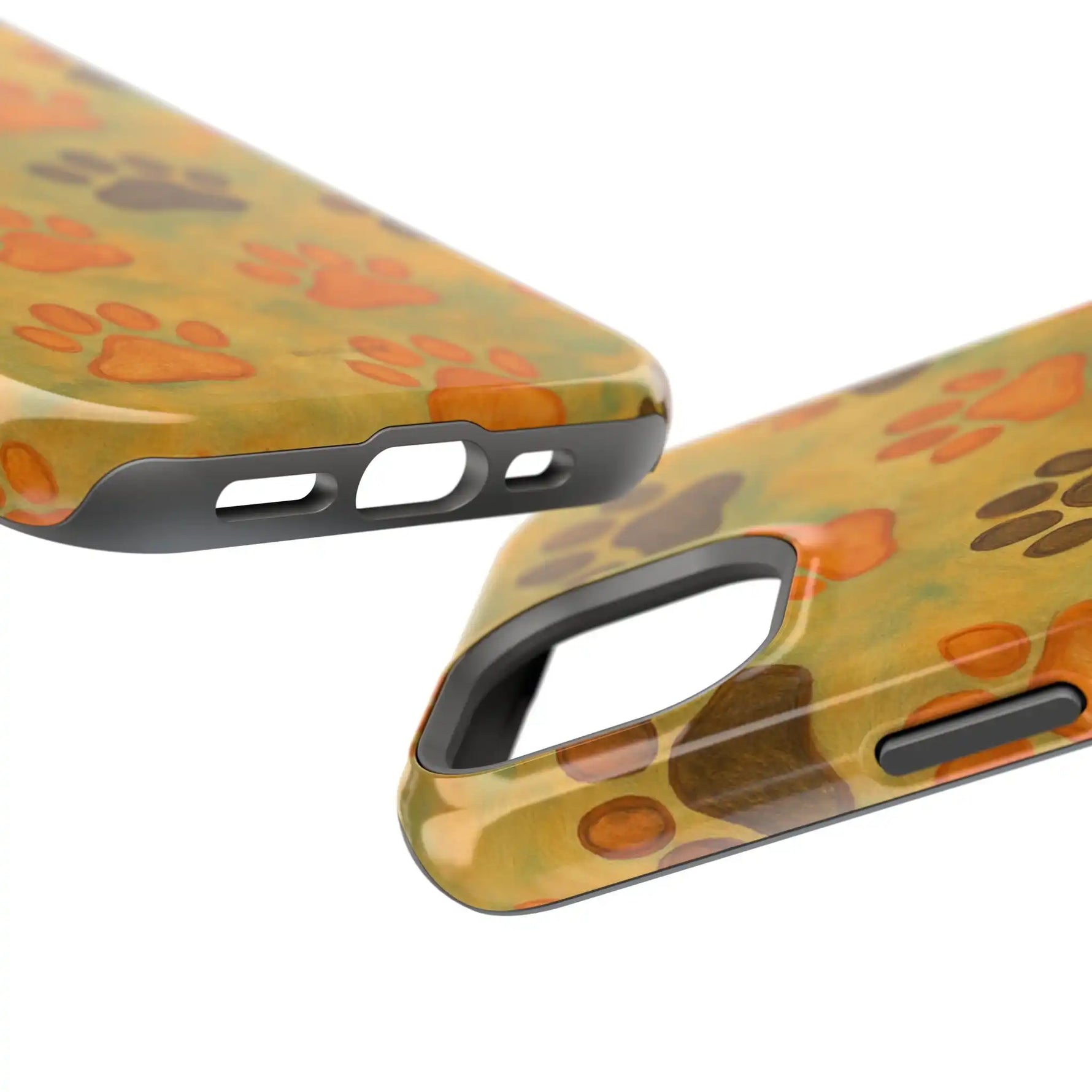 Two close-up views of a phone case with orange and brown paw prints on a yellow-green background, showing port and camera cutouts