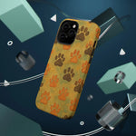 iPhone 13 Pro case size with brown and orange paw print pattern floating in abstract 3D space