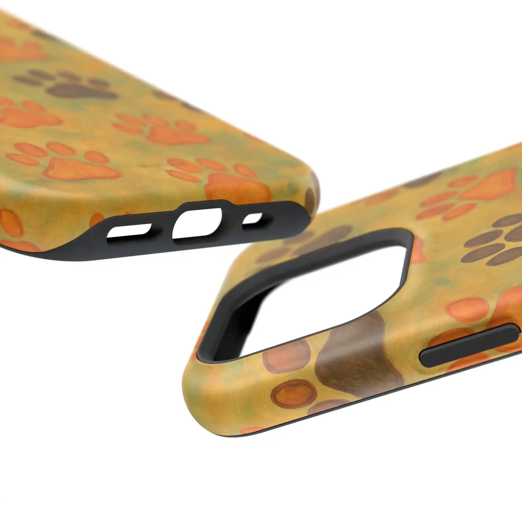Close-up of two yellow and orange paw print phone cases showing varied port and camera cutouts