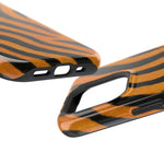 Tiger stripe patterned phone cases in two sizes with precise cutouts for camera and ports