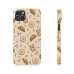 Slanke iPhone-hoes — knus bak- en teddybeerpatroon (recept, hert, knopen)