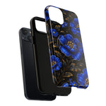 Black iPhone 13 with protective cases including a blue floral design phone case variant size