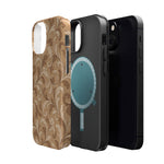 Saddle Scrolls – Tan Western Scrollwork MagSafe Phone Case, glossy diagonal dual-camera model, exploded shell and liner with magnetic ring