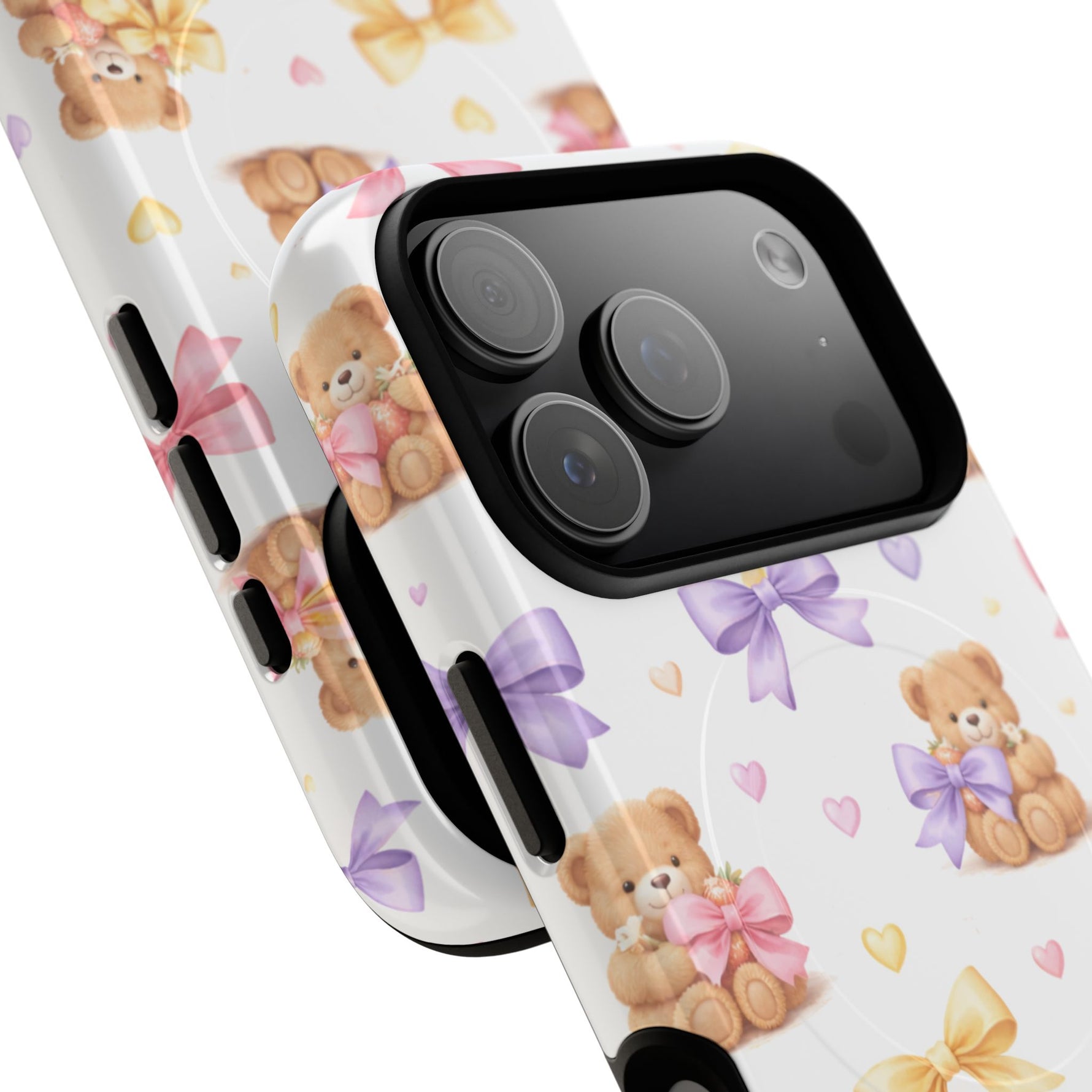 Close-up of smartphone with white case featuring teddy bears holding pink and purple bows, showing variant sizes