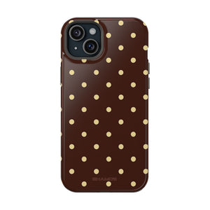 Phone case with small cream polka dots on a dark brown background