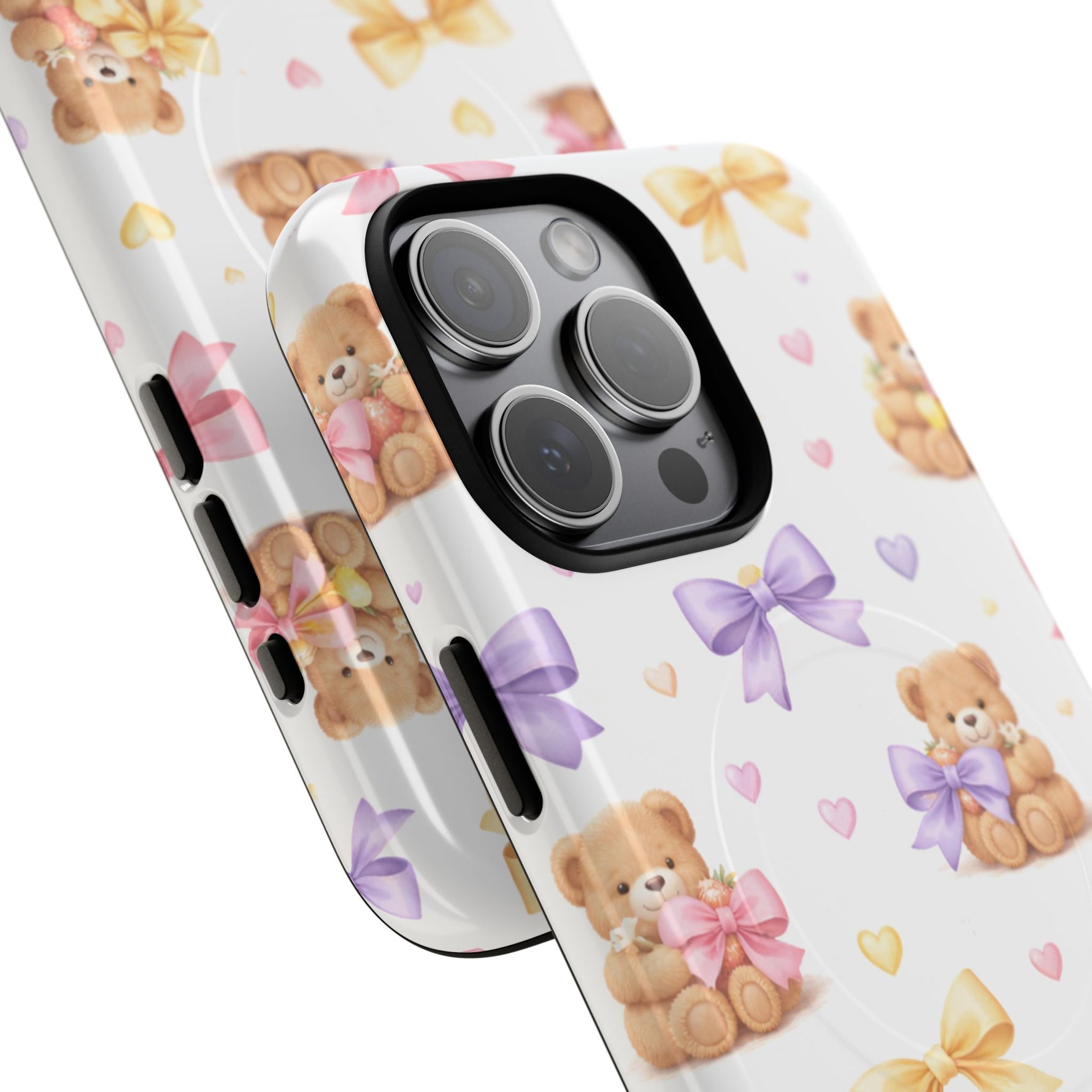 Two iPhone cases with teddy bear and colorful bow pattern, showing small and larger size variant