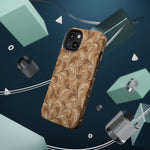 Saddle Scrolls – Tan Western Scrollwork MagSafe Phone Case, glossy diagonal dual-camera model, rear view with magnetic accessories