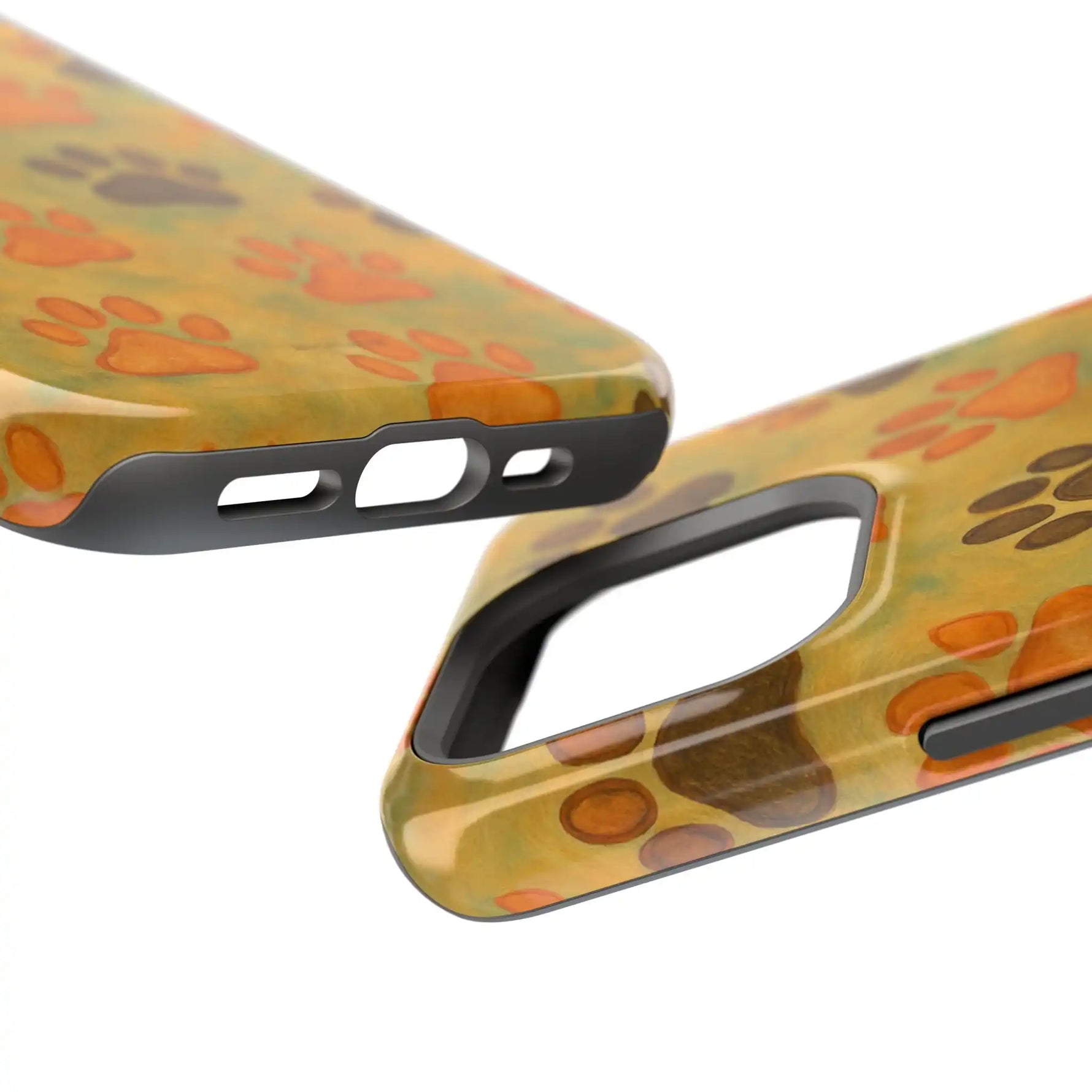 Close-up of two phone cases with colorful paw print pattern showing varied sizes and cutouts