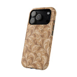 Saddle Scrolls – Tan Western Scrollwork MagSafe Phone Case, glossy compact wide-camera Pro model, angled rear view