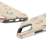 Prairie Horseshoes MagSafe Phone Case, glossy diagonal dual-camera model, port openings and edge details