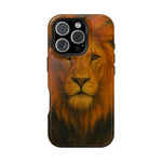 iPhone 13 Pro phone case with a detailed lion face design in orange and brown hues, showing camera cutout