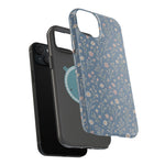 Denim Wildflowers MagSafe Phone Case, glossy diagonal dual-camera model, exploded shell and liner with magnetic ring