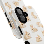 Small and large phone cases with cute bunny print, showing variant size and camera cutouts