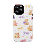 Phone case with small teddy bears holding bows in pink, purple, and yellow, with hearts and ribbon patterns