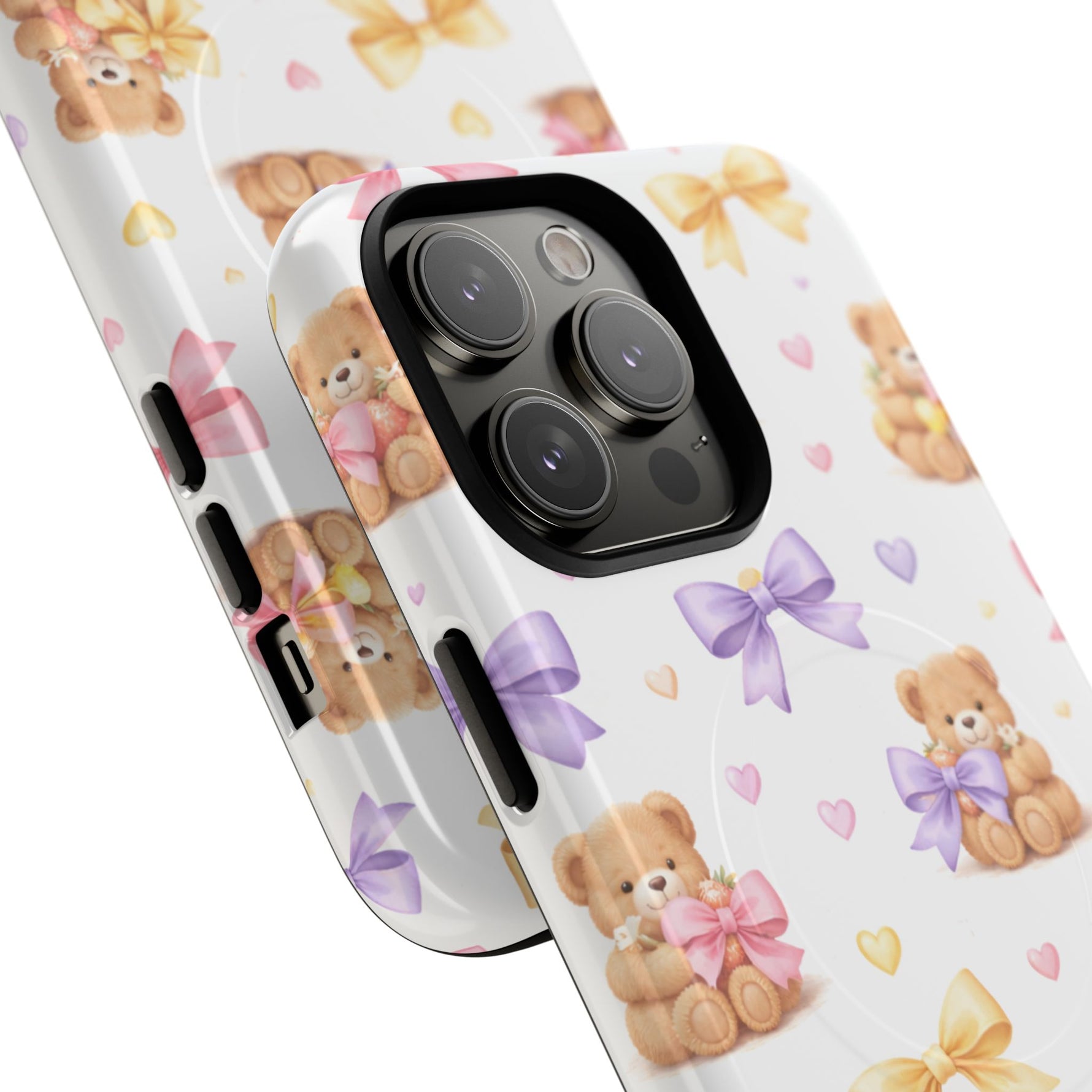 Two white phone cases with teddy bear and pastel bow pattern, showing variant size for triple camera phones