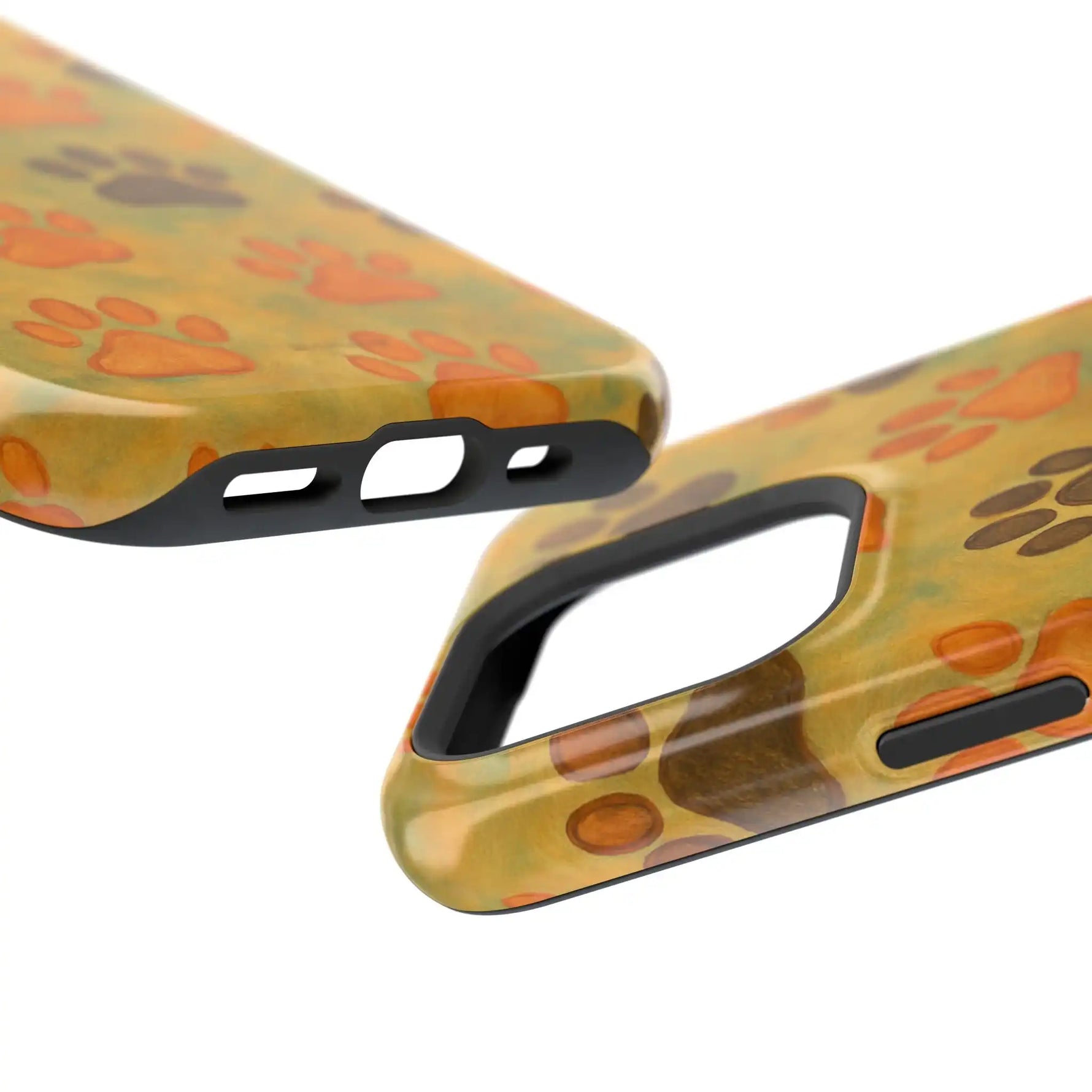 Two yellow phone case variants with orange and brown paw prints, showing camera and charging port sizes