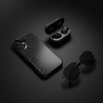 Black surface flat lay