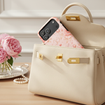 Case peeking from handbag