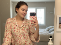 Casual mirror selfie - woman in floral shirt