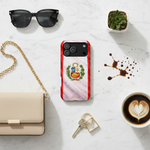 Flat lay with Peruvian flag case and accessories