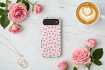 Flat lay with pink rose case
