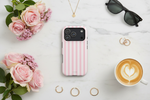 Flat lay with pink stripe case