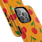 Orange cherry MagSafe case overlapping camera detail #iphone-16-pro-max