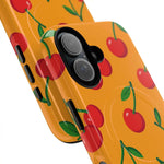 Orange cherry MagSafe case overlapping camera detail #iphone-16-plus