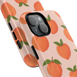 Close-up of overlapping peach-pattern cases with diagonal dual-camera opening #iphone-15-plus
