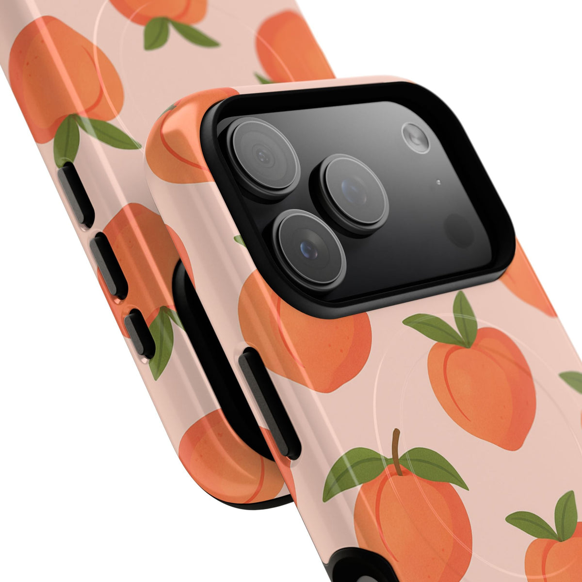 Close-up of overlapping peach-pattern cases with wide triple-camera opening #iphone-17-pro-max