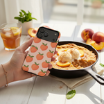 Peach-pattern wide-camera case held beside a peach dessert and drink #iphone-18-pro