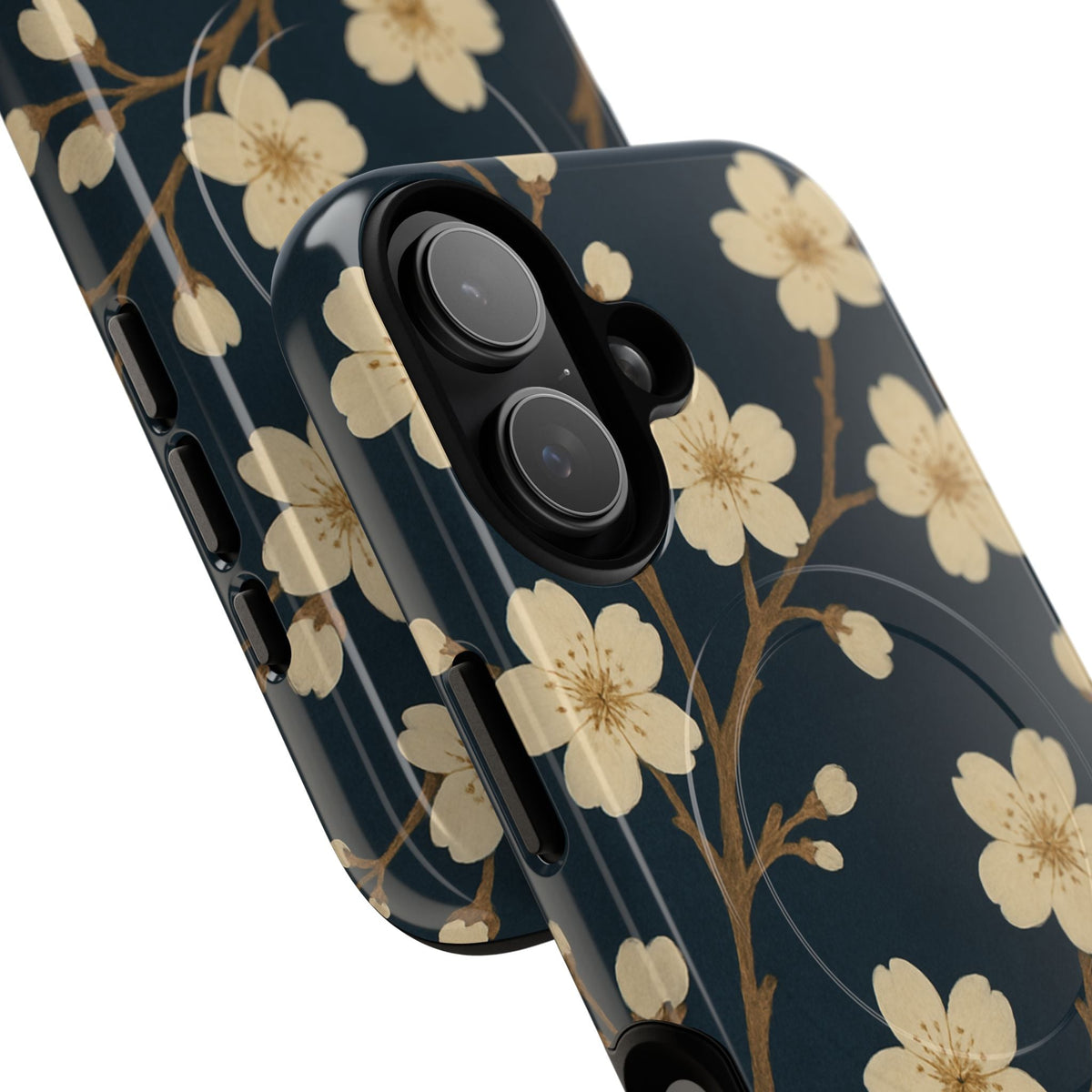Close-up of overlapping navy cherry-blossom cases with vertical dual-camera opening and side controls #iphone-16-plus