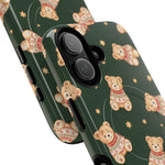 Close-up of overlapping holiday teddy cases #iphone-16
