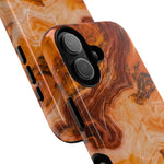 Close-up of overlapping amber agate marble cases with vertical dual-camera opening and side controls #iphone-16-plus