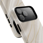 Close-up of overlapping white silk-and-gold cases with wide triple-camera housing #iphone-17-pro