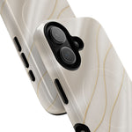 Close-up of overlapping white silk-and-gold cases with vertical dual-camera opening #iphone-16-plus
