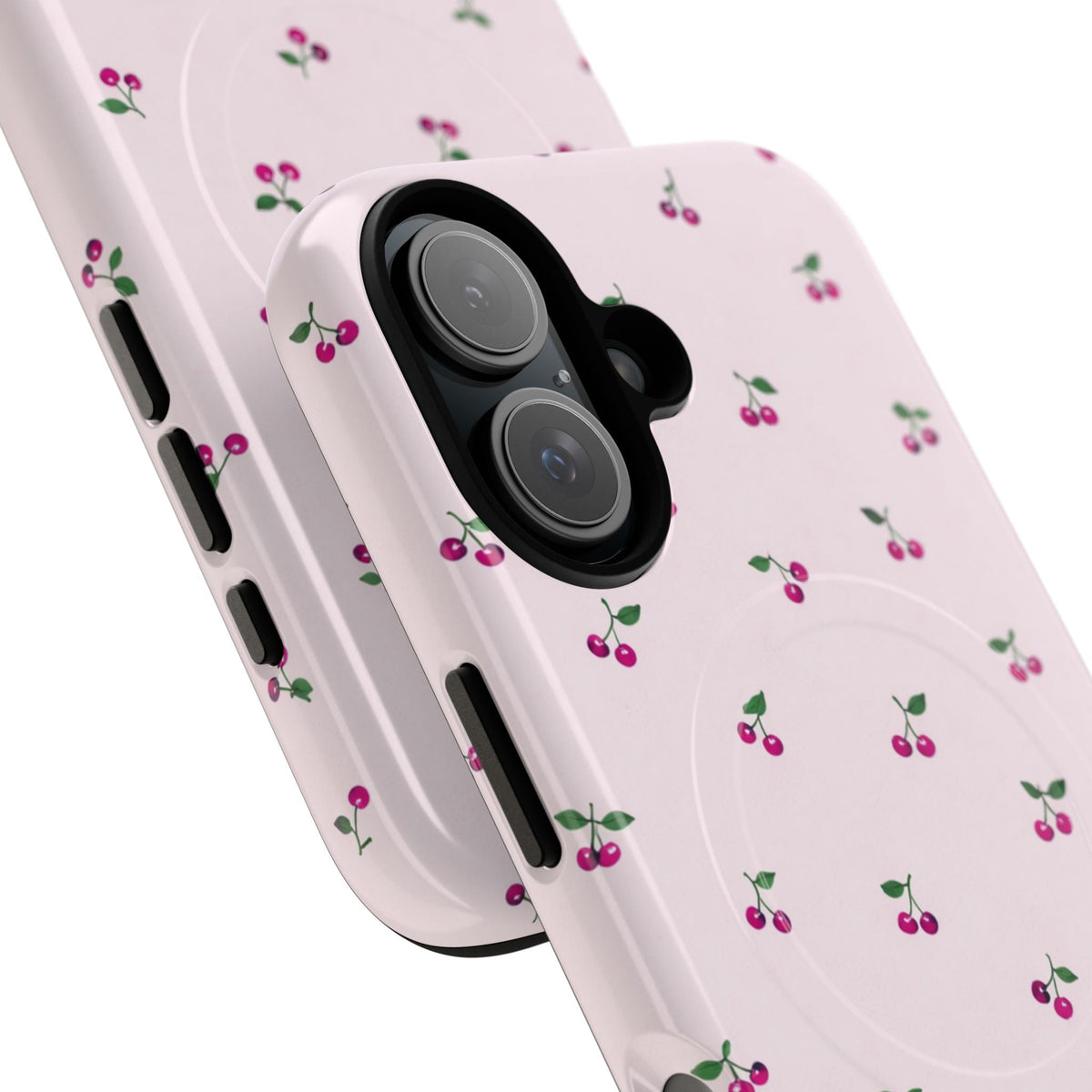 Close-up of overlapping cherry-pattern cases with vertical dual-camera opening #iphone-16