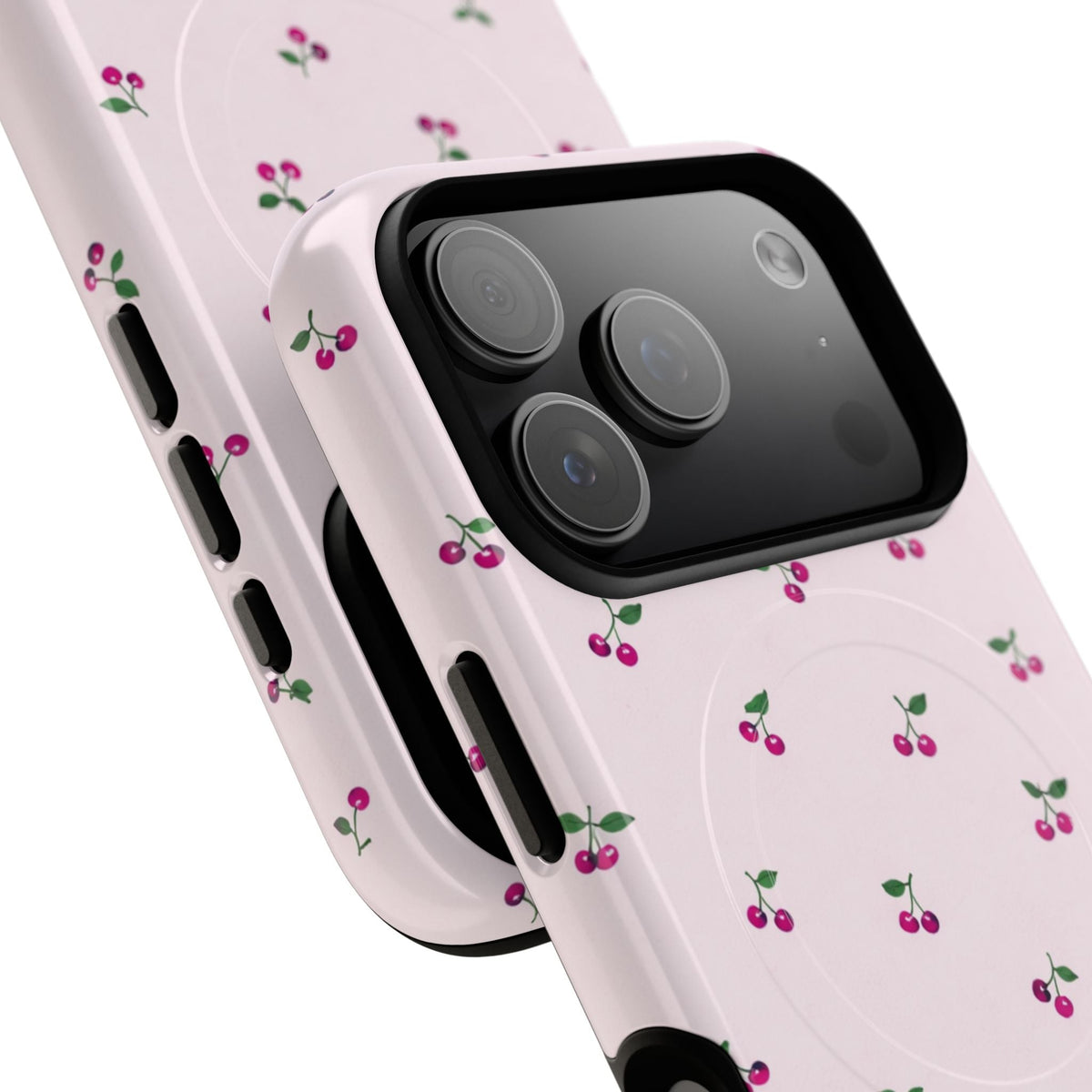 Close-up of overlapping cherry-pattern cases with wide triple-camera opening #iphone-17-pro-max