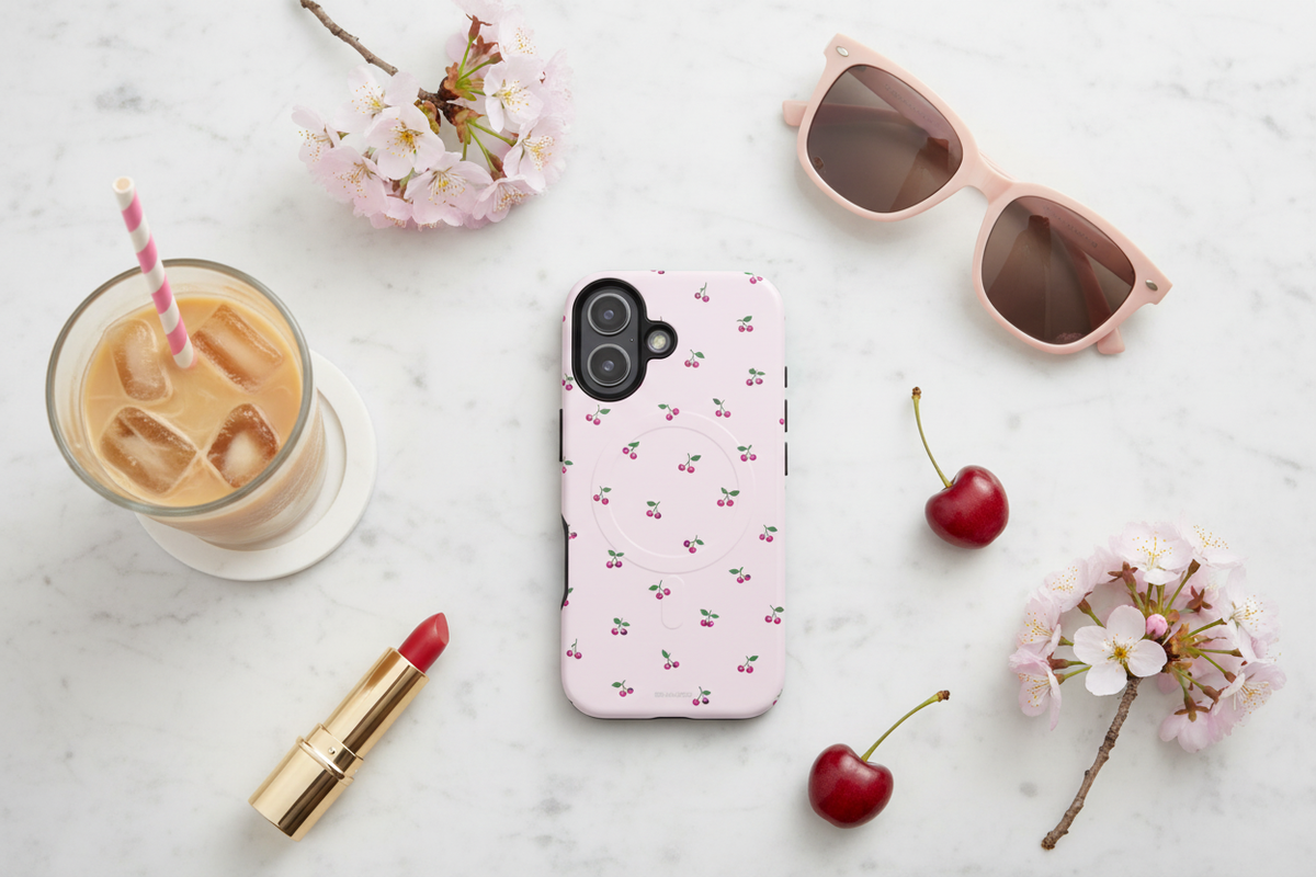 Cherry-pattern pink vertical dual-camera case in a marble flat lay #iphone-16-plus