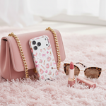 Boss Lady pink beauty case with wide triple-camera opening leaning against a pink handbag #iphone-18-pro