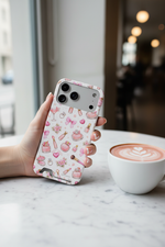 Boss Lady pink beauty card-slot case with wide triple-camera opening held beside a cafe latte #iphone-17-pro-max