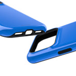 Close-up of cobalt blue case bottom ports beside a wide horizontal camera cutout #iphone-17-pro