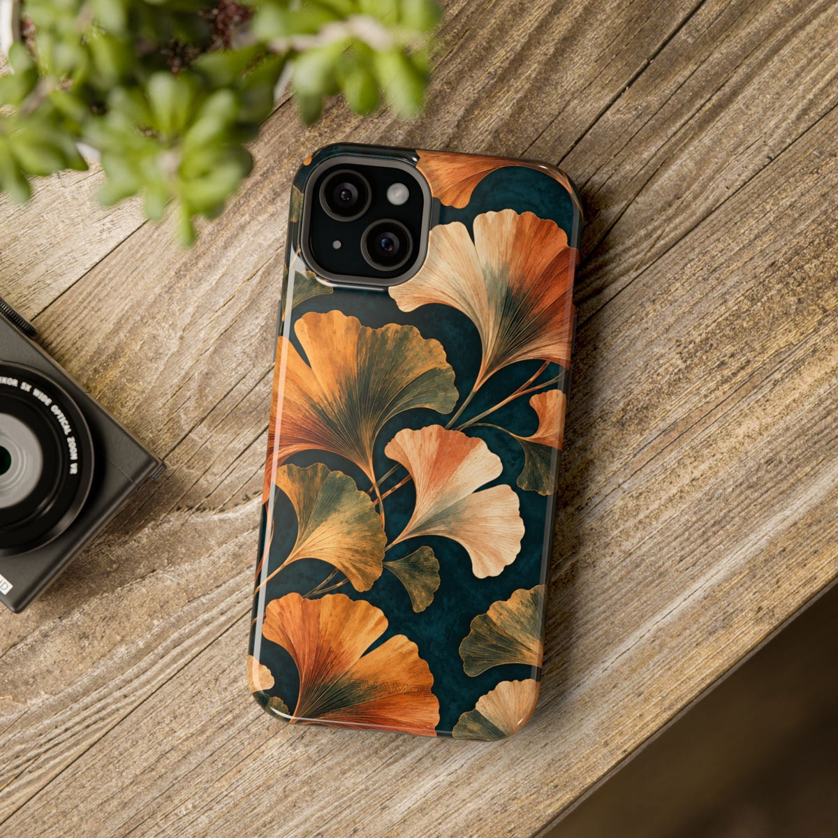 Nocturne Ginkgo MagSafe phone case, case on wooden tabletop #iphone-13-mini