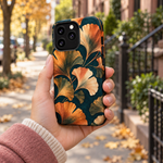 Adult woman holding the Nocturne Ginkgo iPhone 13 Pro case outdoors #iphone-13-pro