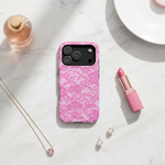 Pink lace phone case flat lay