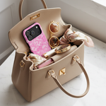 Pink lace phone case in handbag